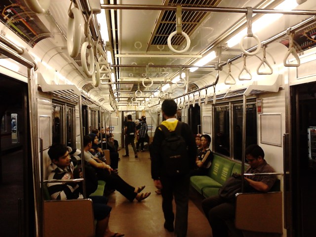 Inside the Jakarta Commuter Line at night