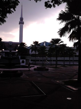 Masjid Negara Malaysia under the dark clouds