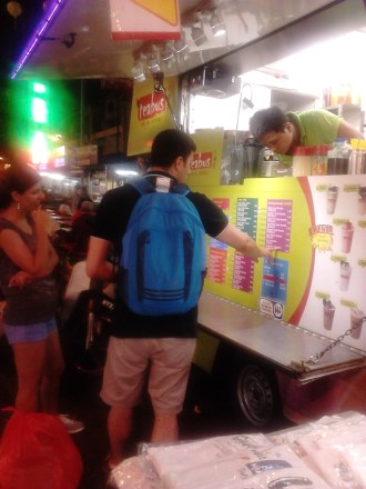 A customer picking a juice