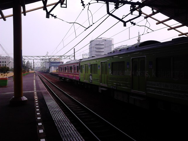 The Kota - Bekasi train passing by at Gondangdia Station, Jakarta