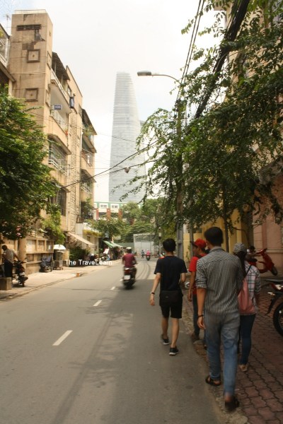 Walking toward the Bitexco Financial Tower