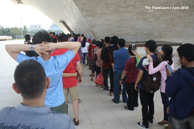 Long queue to enter the elevator in Monumen Nasional (Monas), Jakarta